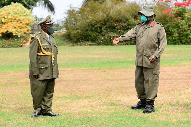 Maj Nadduli with Gen. Museveni During the Retirement Ceremony in State in 2021.